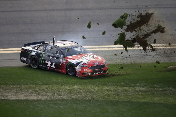 Kurt Busch celebrates winning the Daytona 500 with a burnout in the infield grass. (Getty Images)