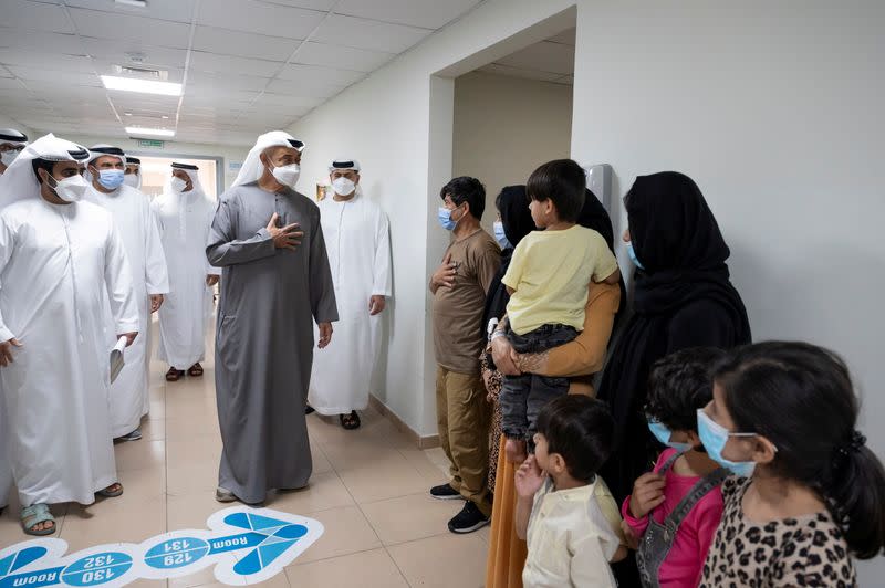 FILE PHOTO: Abu Dhabi's Crown Prince Sheikh Mohammed bin Zayed al-Nahyan visits evacuee families from Afghanistan at Emirates Humanitarian City in Abu Dhabi