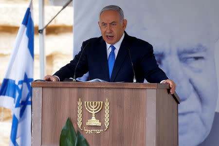 Israeli Prime Minister Benjamin Netanyahu speaks during an annual state memorial ceremony for Israel's first prime minister, David Ben Gurion, at his gravesite in Sde Boker, Israel November 14, 2018. REUTERS/Ronen Zvulun