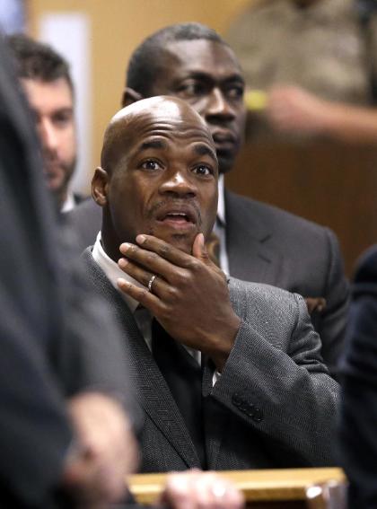 Adrian Peterson is suspended indefinitely without pay. (AP Photo)