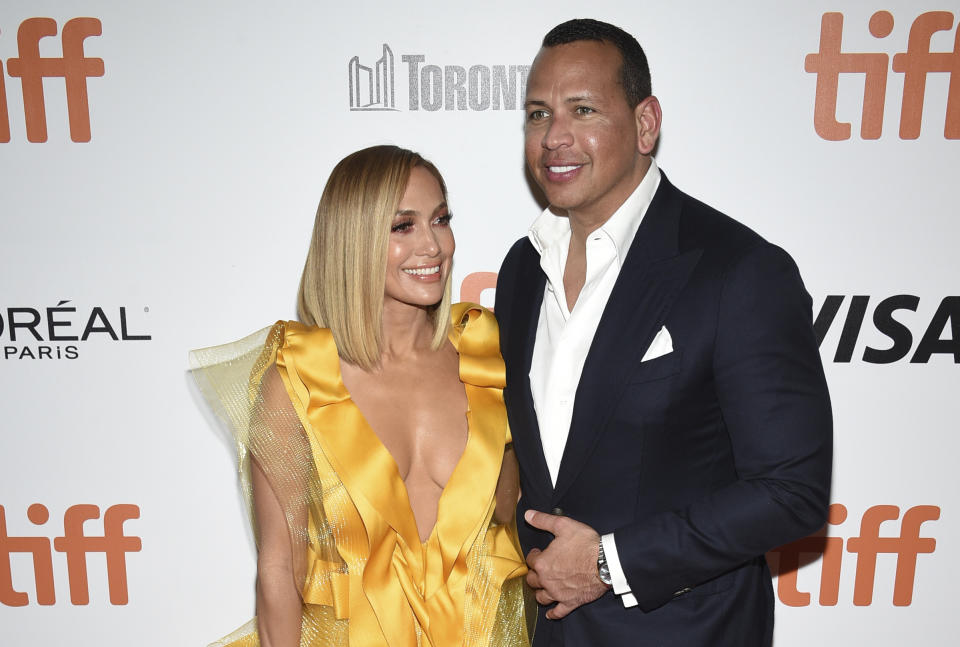 Jennifer Lopez, left, and Alex Rodriguez attend the premiere for "Hustlers" on day three of the Toronto International Film Festival at Roy Thomson Hall on Saturday, Sept. 7, 2019, in Toronto. (Photo by Evan Agostini/Invision/AP)