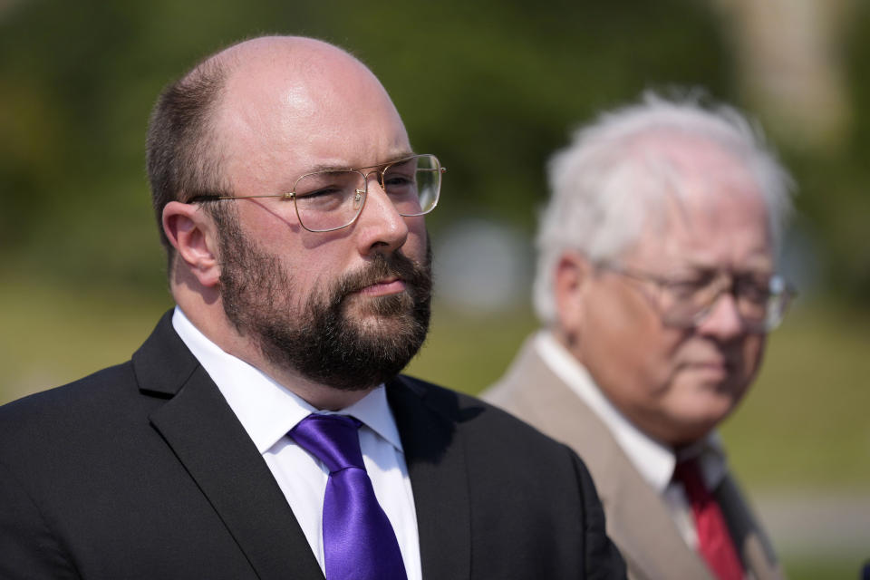 Iowa Libertarian congressional candidates Marco Battaglia, left, and Charles Aldrich speak to reporters after a hearing before the Iowa Supreme Court, Tuesday, Sept. 10, 2024, in Des Moines, Iowa. (AP Photo/Charlie Neibergall)