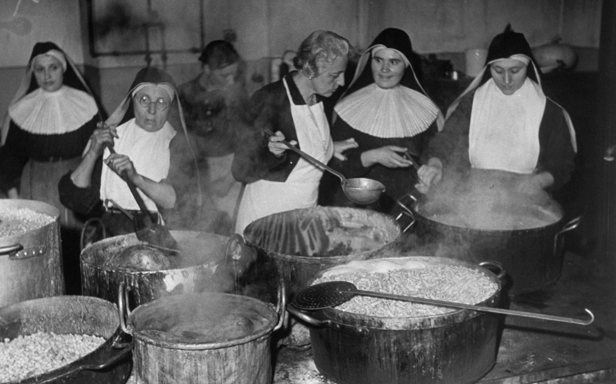 Nuns work at a Vatican-supervised soup kitchen for the needy  - The LIFE Picture Collection