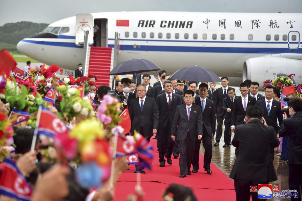 In this photo provided by the North Korean government, China's Vice Chairman of the standing committee of the country’s National People’s Congress Li Hongzhong, left, and other Chinese official arrive at the Pyongyang international airport for the upcoming 70th anniversary of an armistice that halted fighting in the 1950-53 Korean War, in Pyongyang, North Korea, Thursday, July 27, 2023. Independent journalists were not given access to cover the event depicted in this image distributed by the North Korean government. The content of this image is as provided and cannot be independently verified. Korean language watermark on image as provided by source reads: "KCNA" which is the abbreviation for Korean Central News Agency. (Korean Central News Agency/Korea News Service via AP)