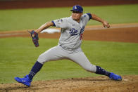 Los Angeles Dodgers pitcher Victor Gonzalez throws against the Tampa Bay Rays during the eighth inning in Game 5 of the baseball World Series Sunday, Oct. 25, 2020, in Arlington, Texas. (AP Photo/Eric Gay)