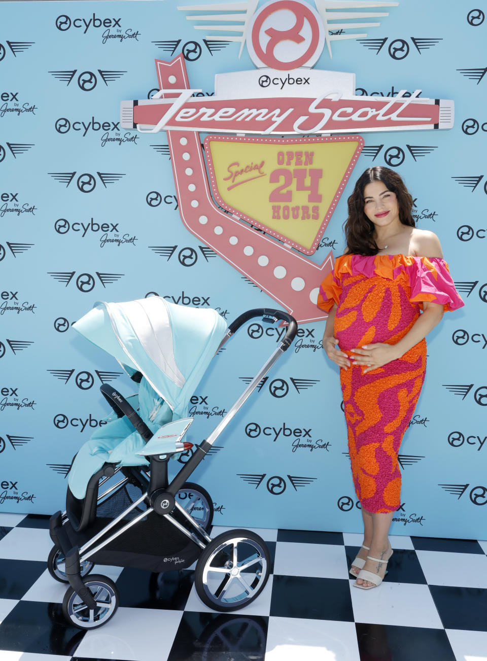 Jenna Dewan attends CYBEX Jeremy Scott Car Collection Launch Event in Los Angeles wearing a paur of strappy sandals