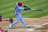 CORRECTS TO THIRD INNING-St. Louis Cardinals' Yadier Molina (4) hits a three-run homer during the third inning of a baseball game against the Philadelphia Phillies, Saturday, April 17, 2021, in Philadelphia. (AP Photo/Laurence Kesterson)