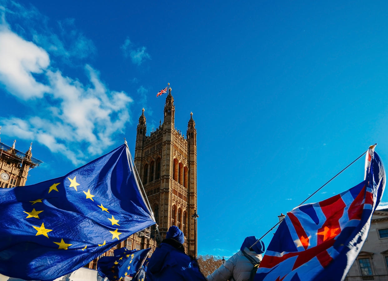 European Union and British Union Jack flags are seen flying in front of the Houses of Parliament at Westminster in London. Photo: Getty