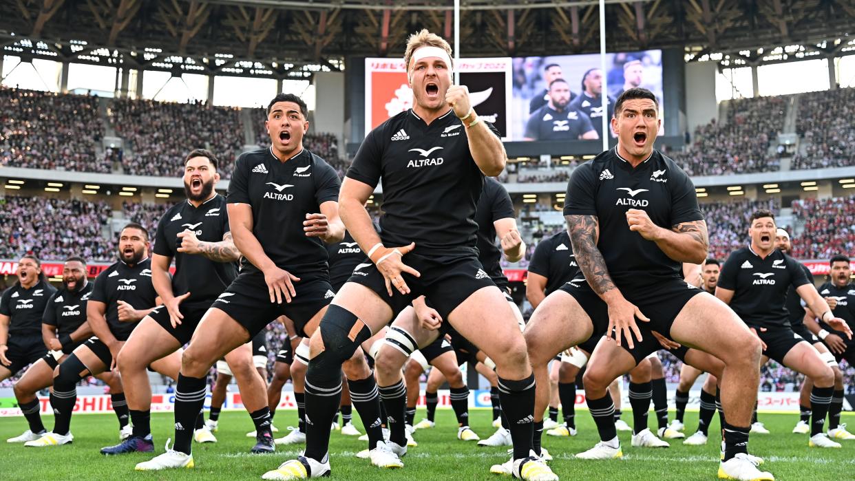  New Zealand players perform the Haka prior to the international test match between Japan and New Zealand All Blacks at National Stadium 