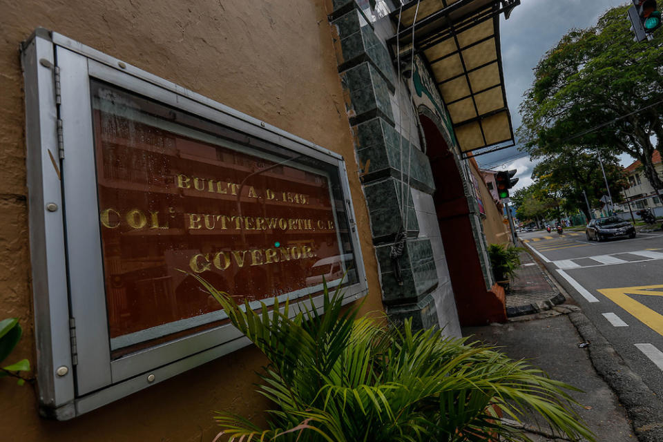 A plaque commemorating the opening of the Penang Prison is seen next to the entrance. — Picture by Sayuti Zainudin