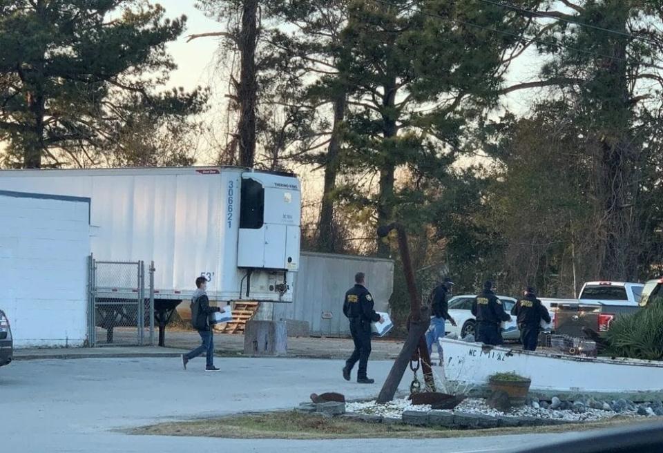 A New Bern fish market was raided by federal agents.