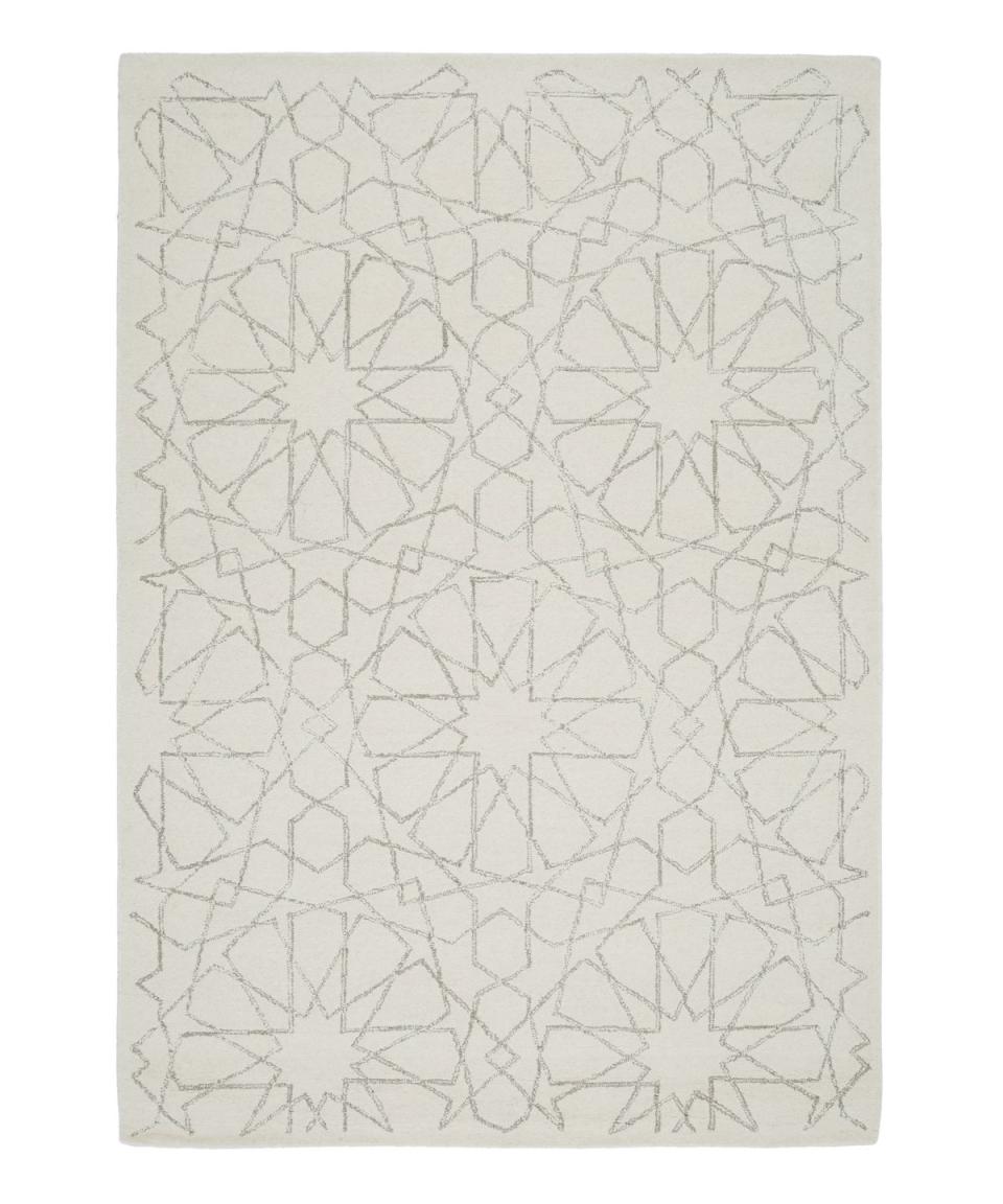 <p>100 per cent wool, contemporary statement design, hand made</p><p><a class="link " href="https://www.carpetright.co.uk/house-beautiful/rugs/house-beautiful-harriet-ivory-rug" rel="nofollow noopener" target="_blank" data-ylk="slk:SEE MORE;elm:context_link;itc:0;sec:content-canvas">SEE MORE</a></p>