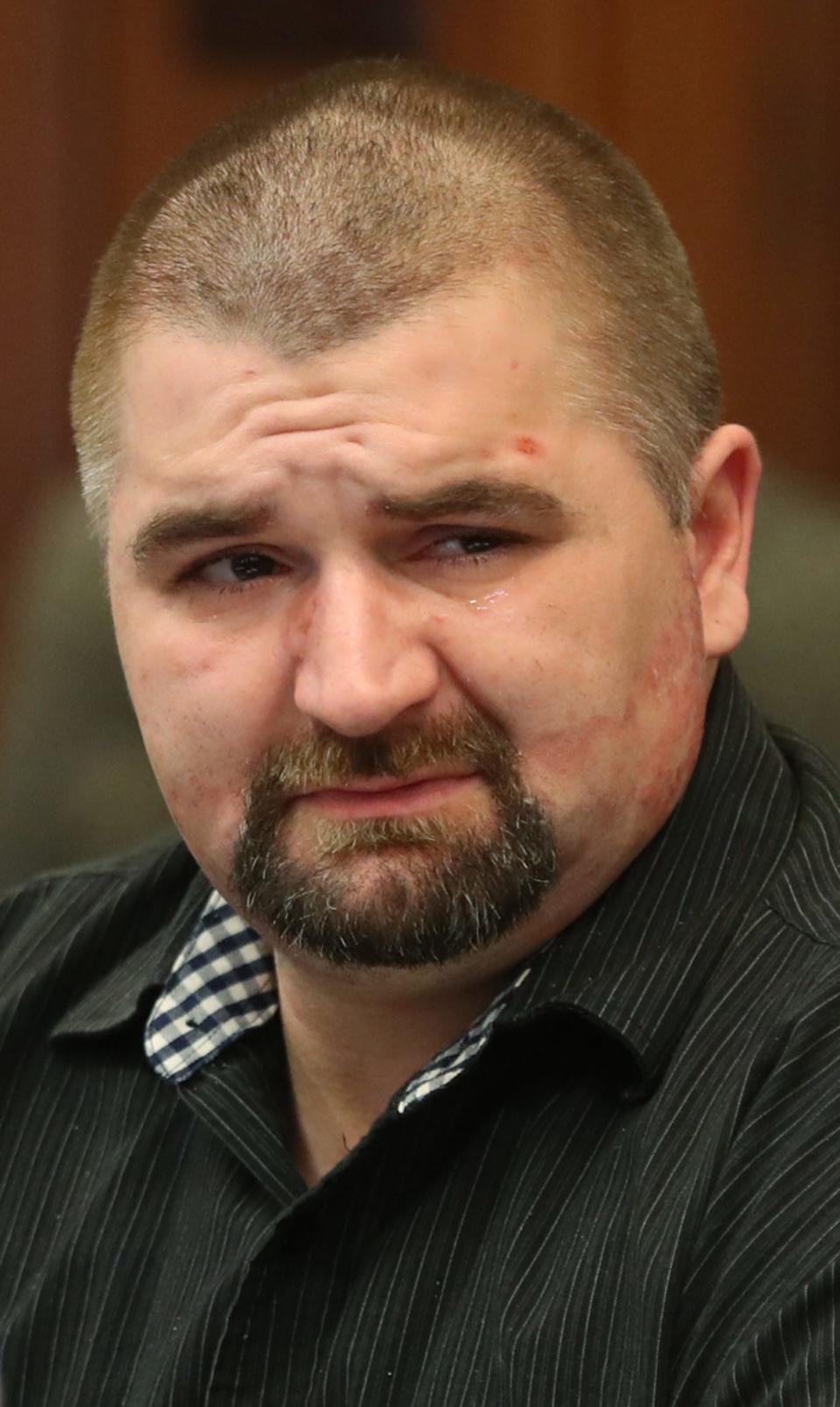 William Huston waits for his sentencing in Summit County Common Pleas Judge Tammy O'Brien courtroom for involuntary manslaughter in the death of his 6-year-old son Logan on Thursday, April 18, 2024 in Akron.