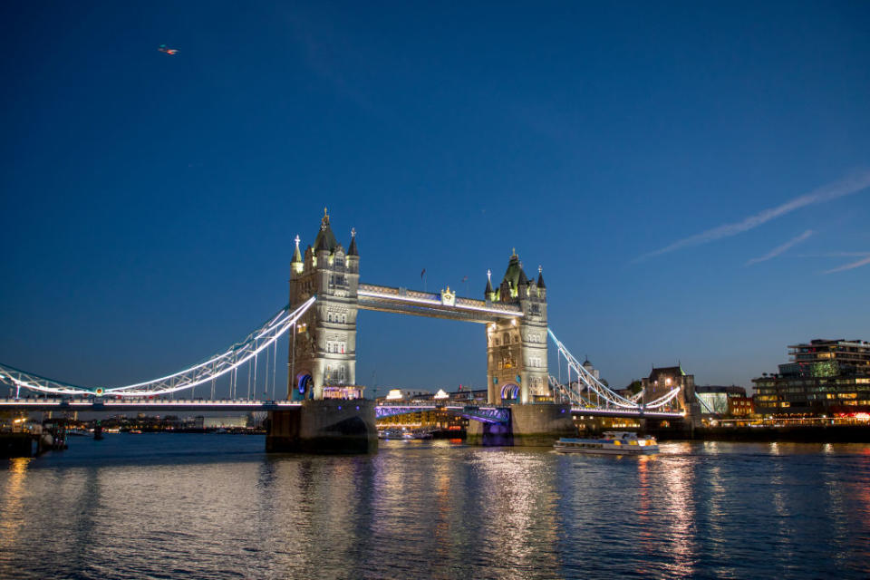 LONDON, ENGLAND – NOVEMBER 02 : The Tower Bridge illuminated at night on November 02, 2018 in London, England. Tower Bridge built 1886–1894. It is a combined bascule and suspension bridge . The bridge crosses the River Thames close to the Tower of London and has become an iconic symbol of London. (Photo by Athanasios Gioumpasis/Getty Images)