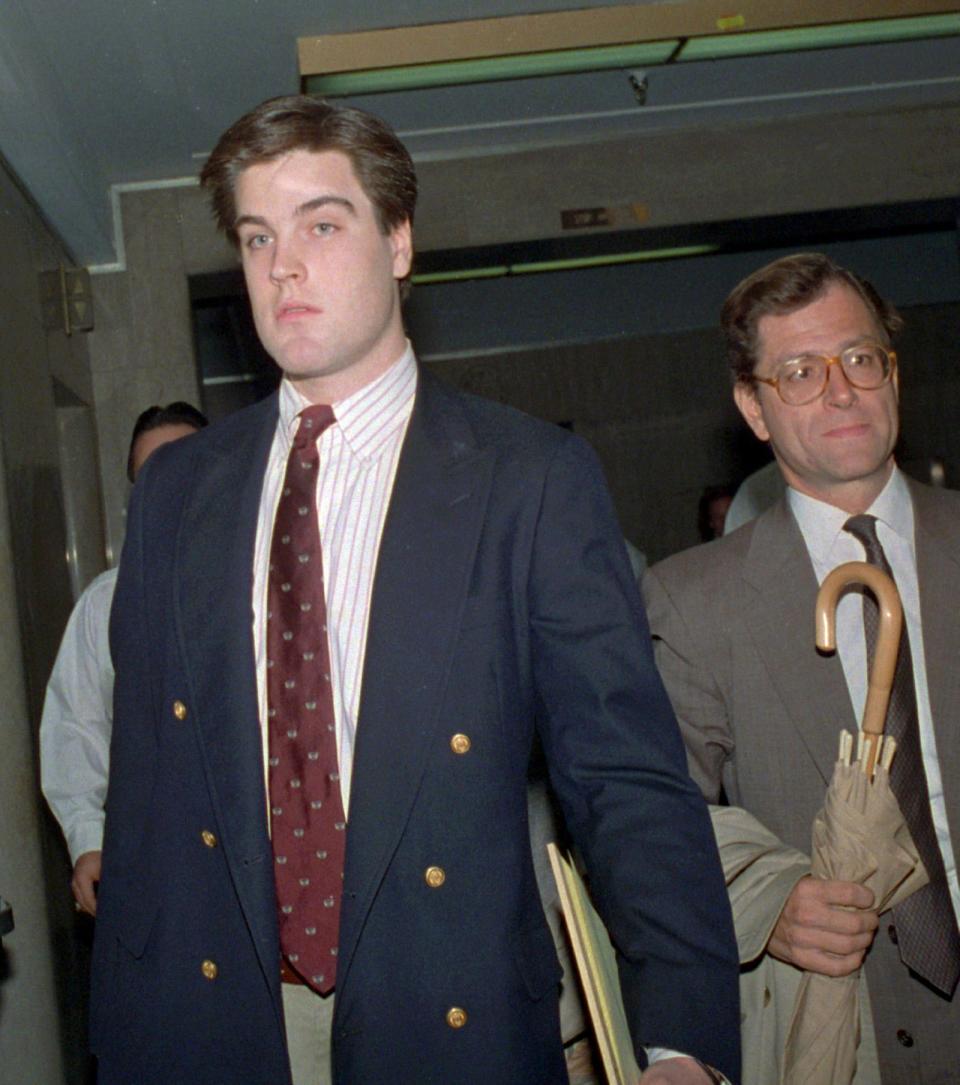 Robert Chambers, left, exits a New York court with his defense attorney Jack Litman on Oct. 21, 1987.