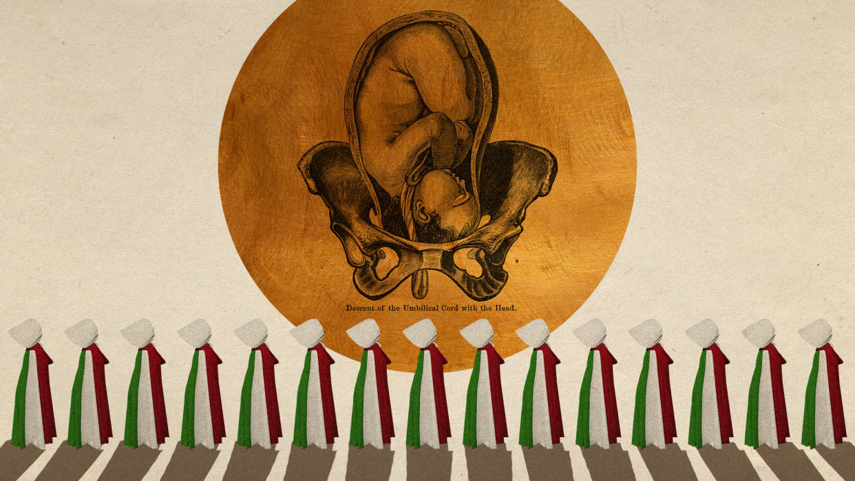  Photo collage of a large engraving of a pelvis with a baby descending from the uterus, with a golden circle for background. In the bottom foreground, there is a row of figures wearing cloaks and bonnets in the style of The Handmaid's Tale. Their cloaks are green, white, and red. 