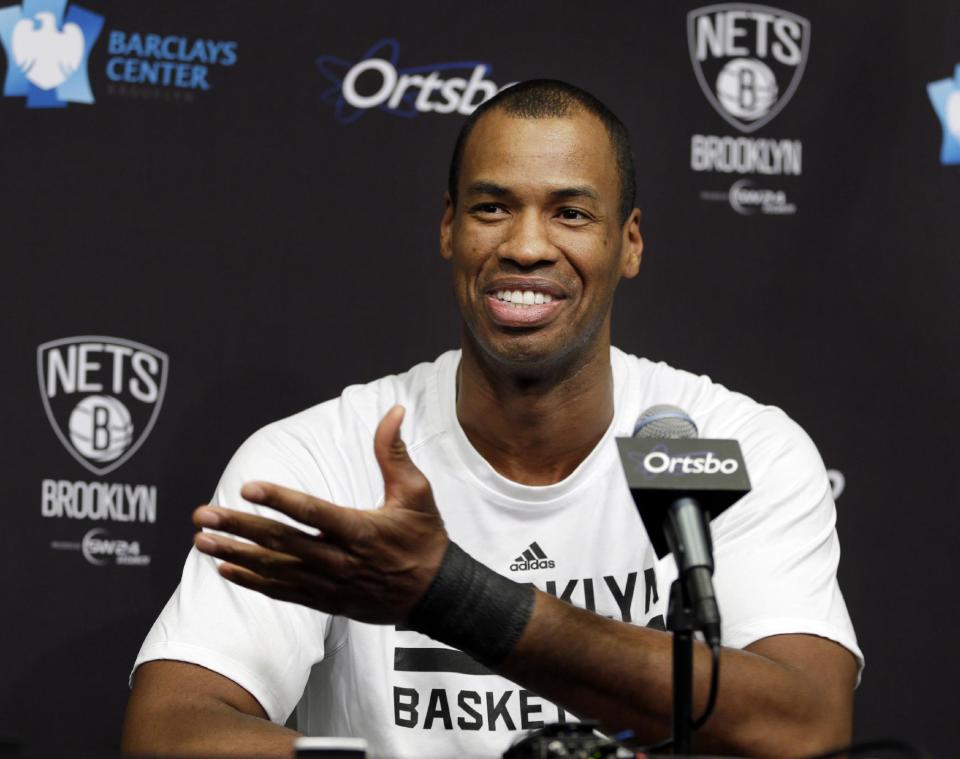 Brooklyn Nets Jason Collins speaks during a news conference before an NBA basketball game against the Chicago Bulls at the Barclays Center, Monday, March 3, 2014, in New York. More than a week after becoming the league's first openly gay player, Collins will finally get to play a home game. (AP Photo/Seth Wenig)