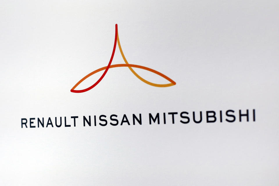 FILE - This Friday Sept. 15, 2017 file photo shows the logo of the Renault-Nissan-Mitsubishi alliance during a press conference in Paris. The new board of the Renault-Nissan-Mitsubishi alliance is holding its first meeting to plot out the group's future without jailed former boss Carlos Ghosn. (AP Photo/Thibault Camus, File)