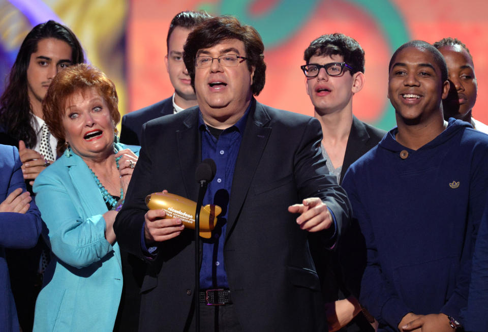 LOS ANGELES, CA - MARCH 29:  Producer Dan Schneider (L) and actors from his shows speak onstage during Nickelodeon's 27th Annual Kids' Choice Awards held at USC Galen Center on March 29, 2014 in Los Angeles, California.  (Photo by Lester Cohen/WireImage)