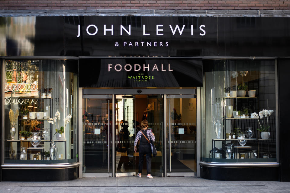 A woman enters the food hall area of the Oxford Street branch of the department store John Lewis and Partners in London, England. Photo: Leon Neal/Getty Images