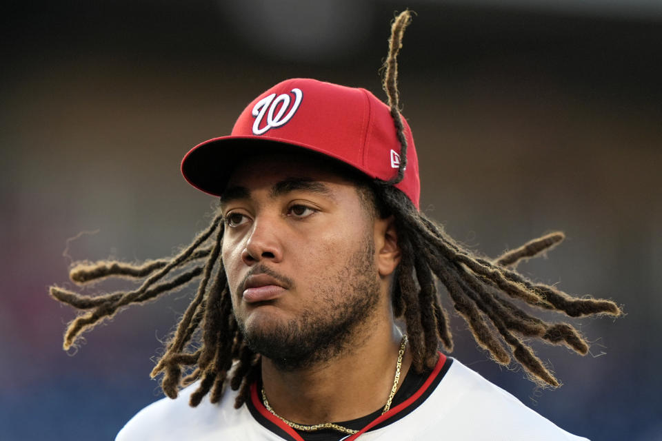 Washington Nationals' James Wood jogs back to the dugout during the thirrd inning of a baseball game against the New York Mets at Nationals Park, Monday, July 1, 2024, in Washington. (AP Photo/Mark Schiefelbein)