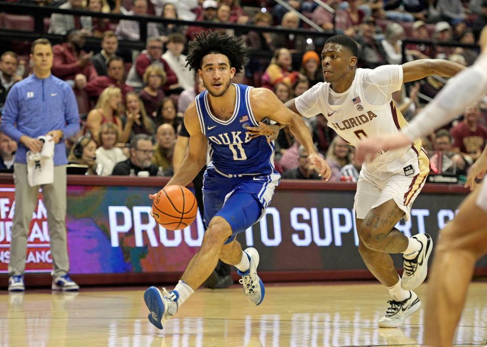 Duke guard Jared McCain (0) drives the ball to the net past Florida State guard Chandler Jackson (0) during the second half at Donald L. Tucker Center.