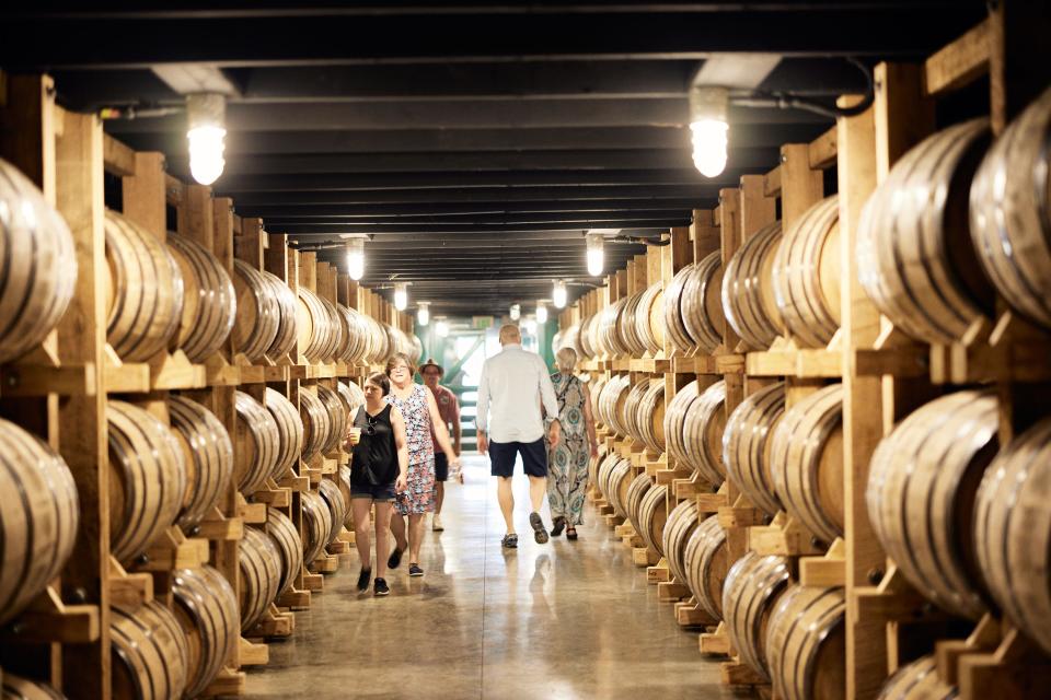 Rows of bourbon aging at Nearest Green Distillery