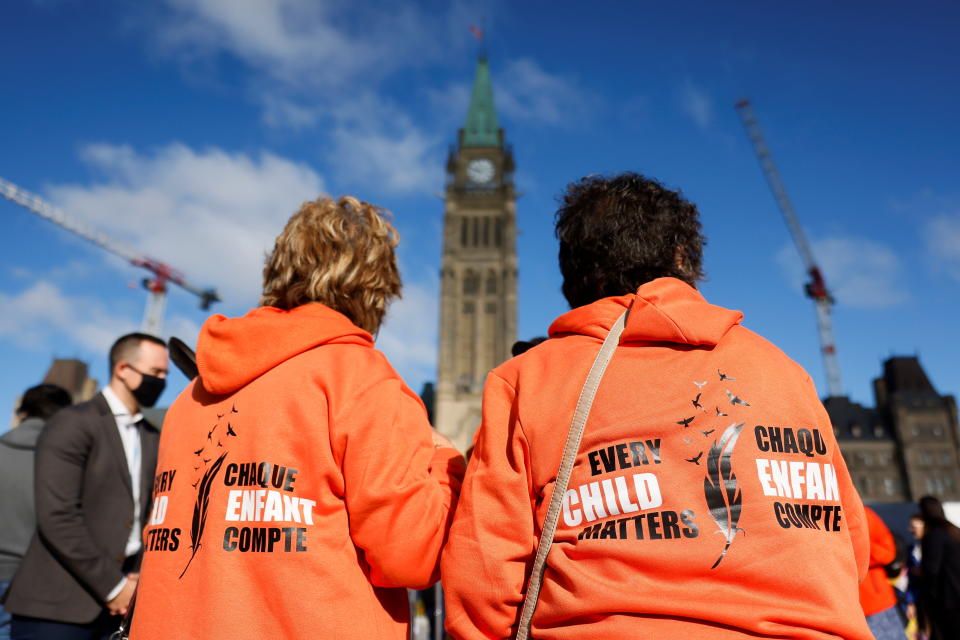 People gather on Parliament Hill for Canada's first National Day for Truth and Reconciliation, honouring the lost children and survivors of Indigenous residential schools, their families and communities, in Ottawa, Ontario, Canada September 30, 2021. REUTERS/Blair Gable