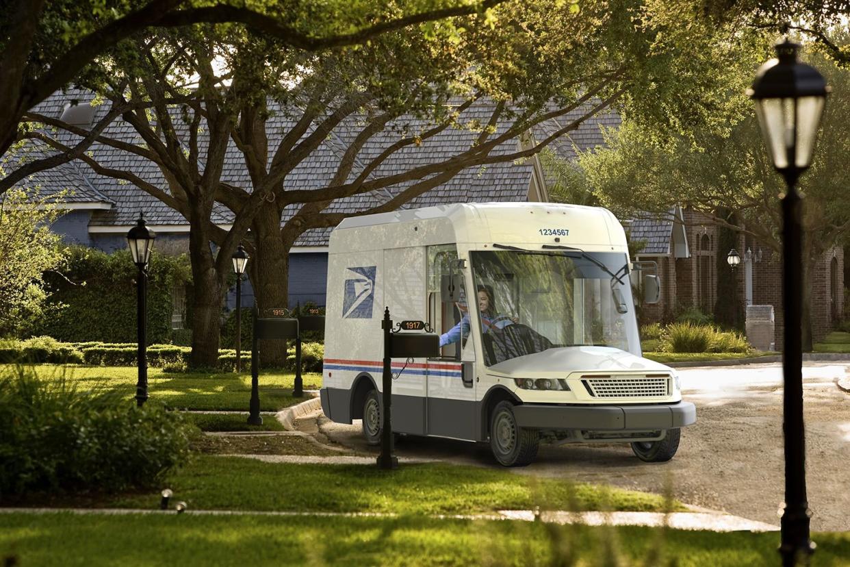 EV U.S. Postal Service vehicle delivering mail