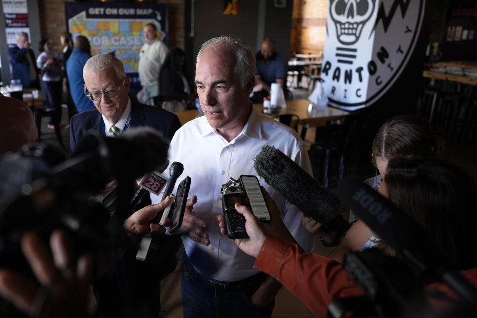 Sen. Bob Casey, D-Pa., speaks to reporters after a campaign event, Monday, July 1, 2024, in Scranton, Pa. (AP Photo/Matt Slocum)