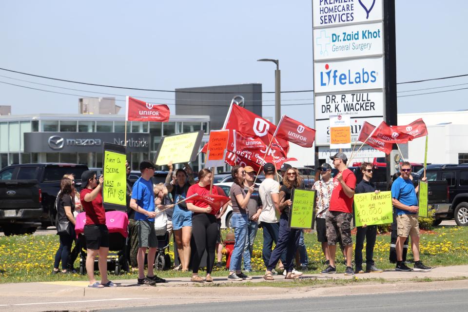 Sault Ste. Marie paramedics, alongside some students in training, occupy the intersection of Great Northern Road and Lukenda Drive Tuesday afternoon to air their grievances over wages and other pitfalls associated with the job. The local paramedics' union and employer are currently negotiating a new contract, with the last agreement having expired on April 1, 2023.