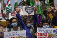 Indian Muslims shout slogans as they react to the derogatory references to Islam and the Prophet Muhammad made by top officials in the governing Hindu nationalist party during a protest in Mumbai, India, Monday, June 6, 2022. At least five Arab nations have lodged official protests against India, and Pakistan and Afghanistan also reacted strongly Monday to the comments made by two prominent spokespeople from Prime Minister Narendra Modi’s Bharatiya Janata Party. (AP Photo/Rafiq Maqbool)