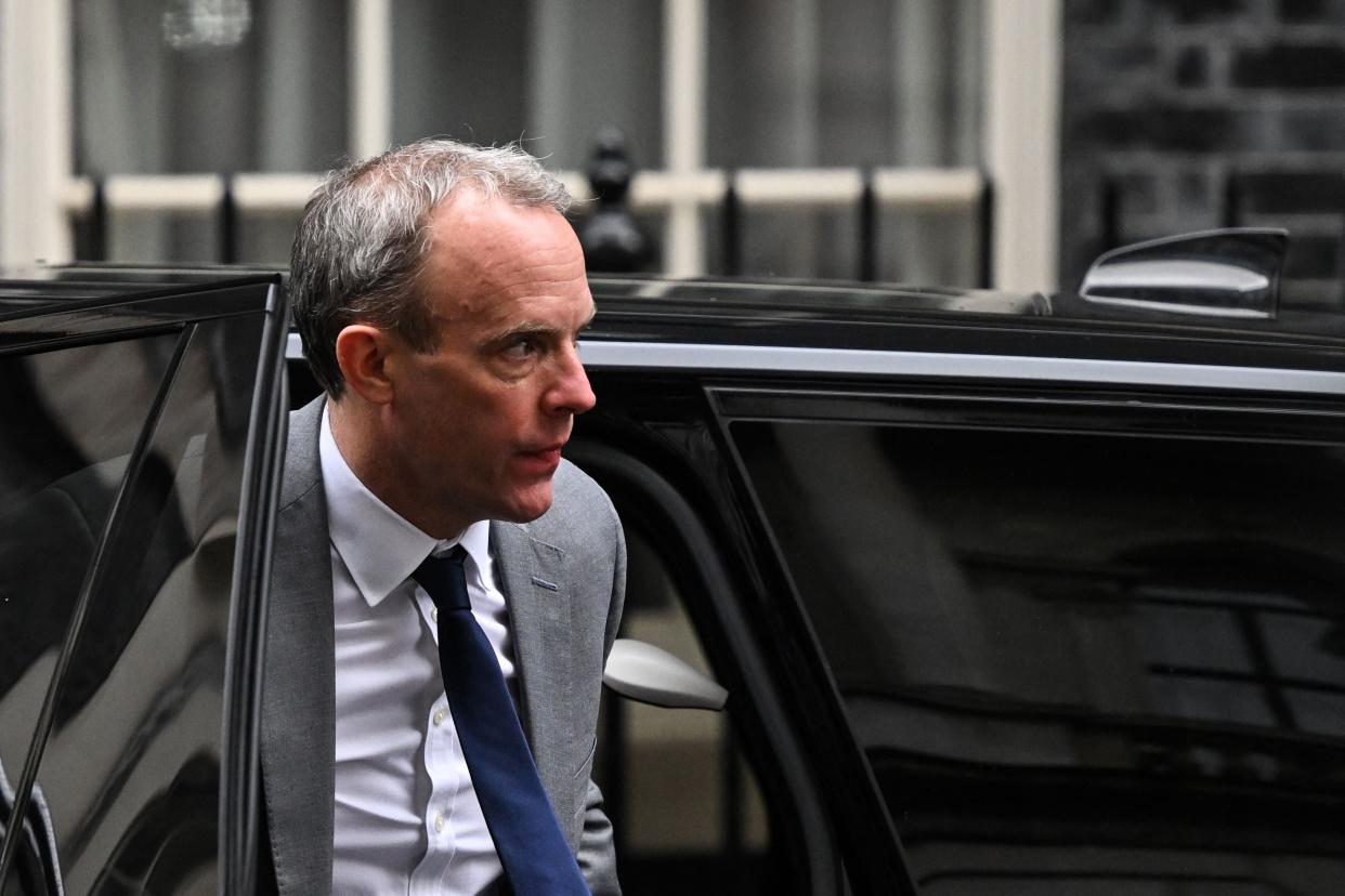 Britain’s justice secretary and deputy prime minister Dominic Raab arrives at 10 Downing Street in central London on 7 March 2023 (AFP via Getty Images)