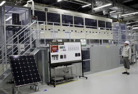 Sharp Corp's solar cell production line is seen at the company's Sakai plant in Sakai, western Japan March 30, 2015. REUTERS/Reiji Murai