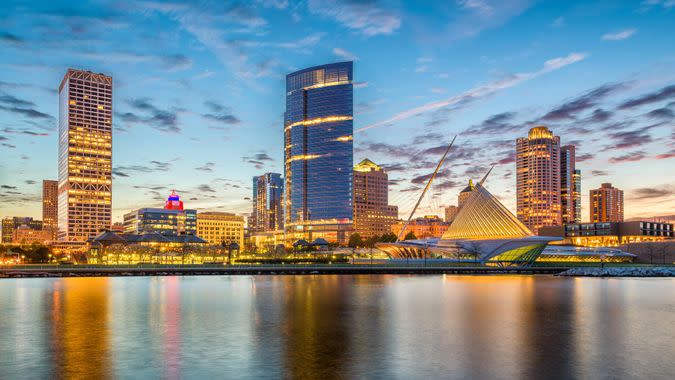 Milwaukee, Wisconsin, USA downtown city skyline on Lake Michigan at twilight.