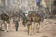 DELHI, INDIA - FEBRUARY 26 : Security members take measures following the Citizenship Amendment Act (CAA) clashes in Mustafabad, Delhi, India on February 26, 2020. (Photo by Javed Sultan/Anadolu Agency via Getty Images)