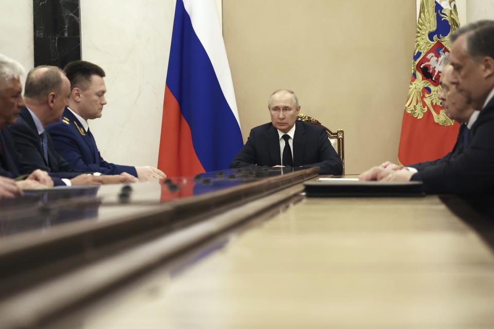 Russian President Vladimir Putin chairs a meeting with the heads of Russian law enforcement agencies at the Kremlin in Moscow, Russia, Monday, June 26, 2023. (Valery Sharifulin, Sputnik, Kremlin Pool Photo via AP)