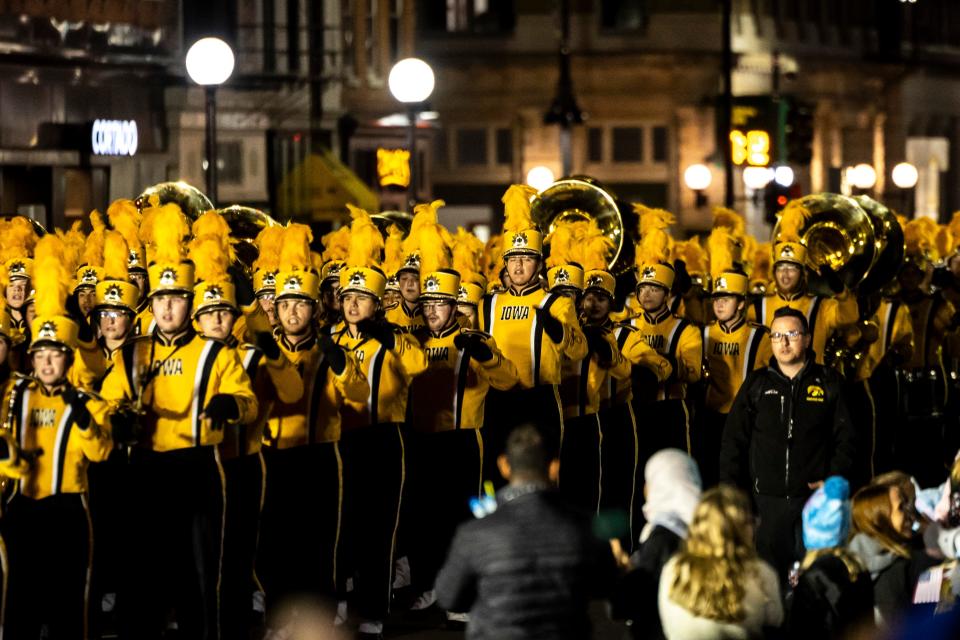 Members of the University of Iowa Hawkeye Marching Band perform during the University of Iowa Homecoming parade, Friday, Oct. 6, 2023, in Iowa City, Iowa.