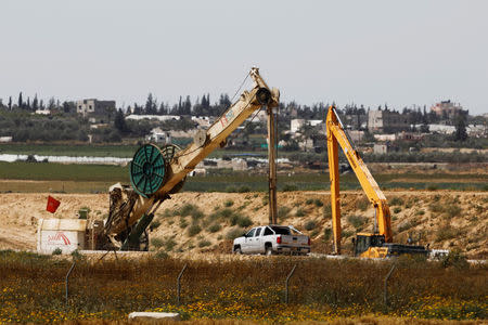 Construction work can be seen on the Israeli side of the border between Israel and the Gaza Strip, Israel March 18, 2018. REUTERS/Amir Cohen