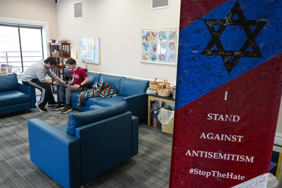 Jewish students gather at the Helene G. Simon Hillel Center at Indiana University in Bloomington, Ind., Tuesday, Feb. 13, 2024. An Indiana bill to address antisemitism on college campuses lost support from some members of the Jewish community after an amendment altered language surrounding criticism of Israel. (AP Photo/Michael Conroy)