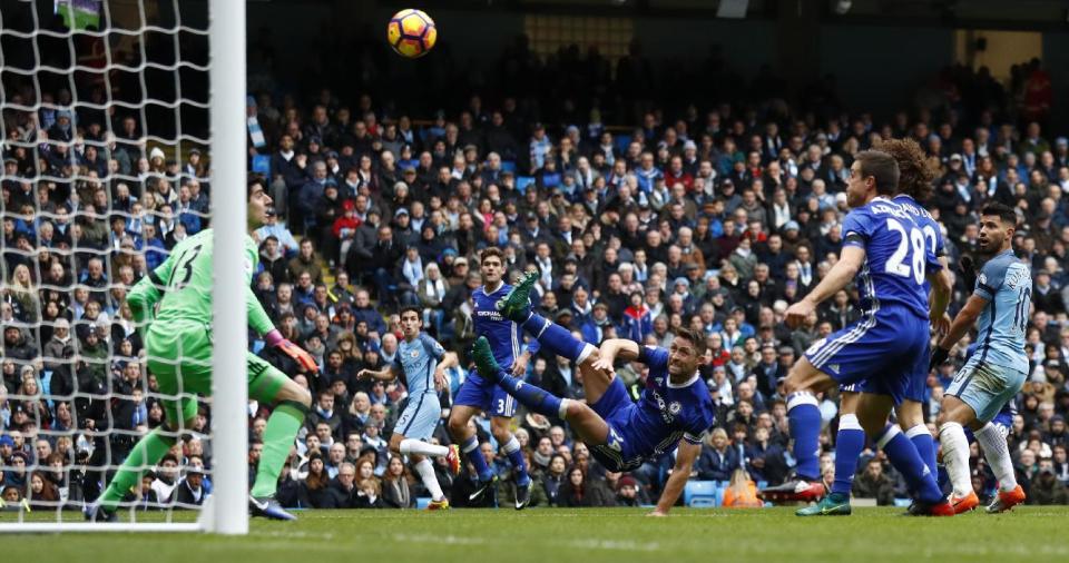 Britain Football Soccer - Manchester City v Chelsea - Premier League - Etihad Stadium - 3/12/16 Chelsea's Gary Cahill scores an own goal and the first goal for Manchester City Action Images via Reuters / Jason Cairnduff Livepic EDITORIAL USE ONLY. No use with unauthorized audio, video, data, fixture lists, club/league logos or "live" services. Online in-match use limited to 45 images, no video emulation. No use in betting, games or single club/league/player publications. Please contact your account representative for further details.