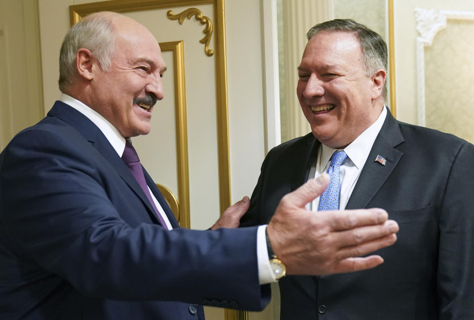 Belarusian President Alexander Lukashenko greets U.S. Secretary of State Mike Pompeo during a meeting in Minsk, Belarus, Saturday, Feb. 1, 2020. (Kevin Lamarque/Pool Photo via AP)