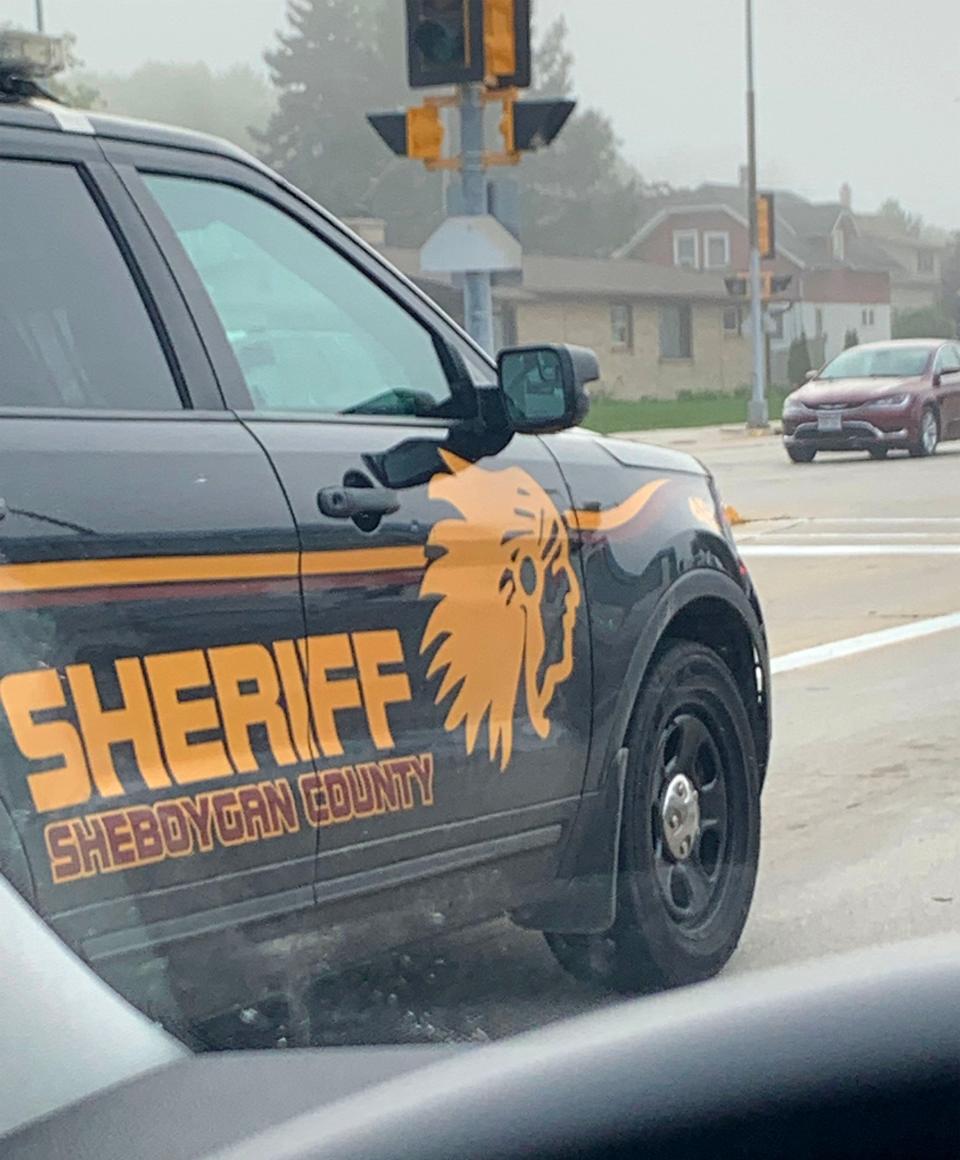 A Sheboygan County sheriff squad car is emblazoned with a chief's head image in fall 2019.