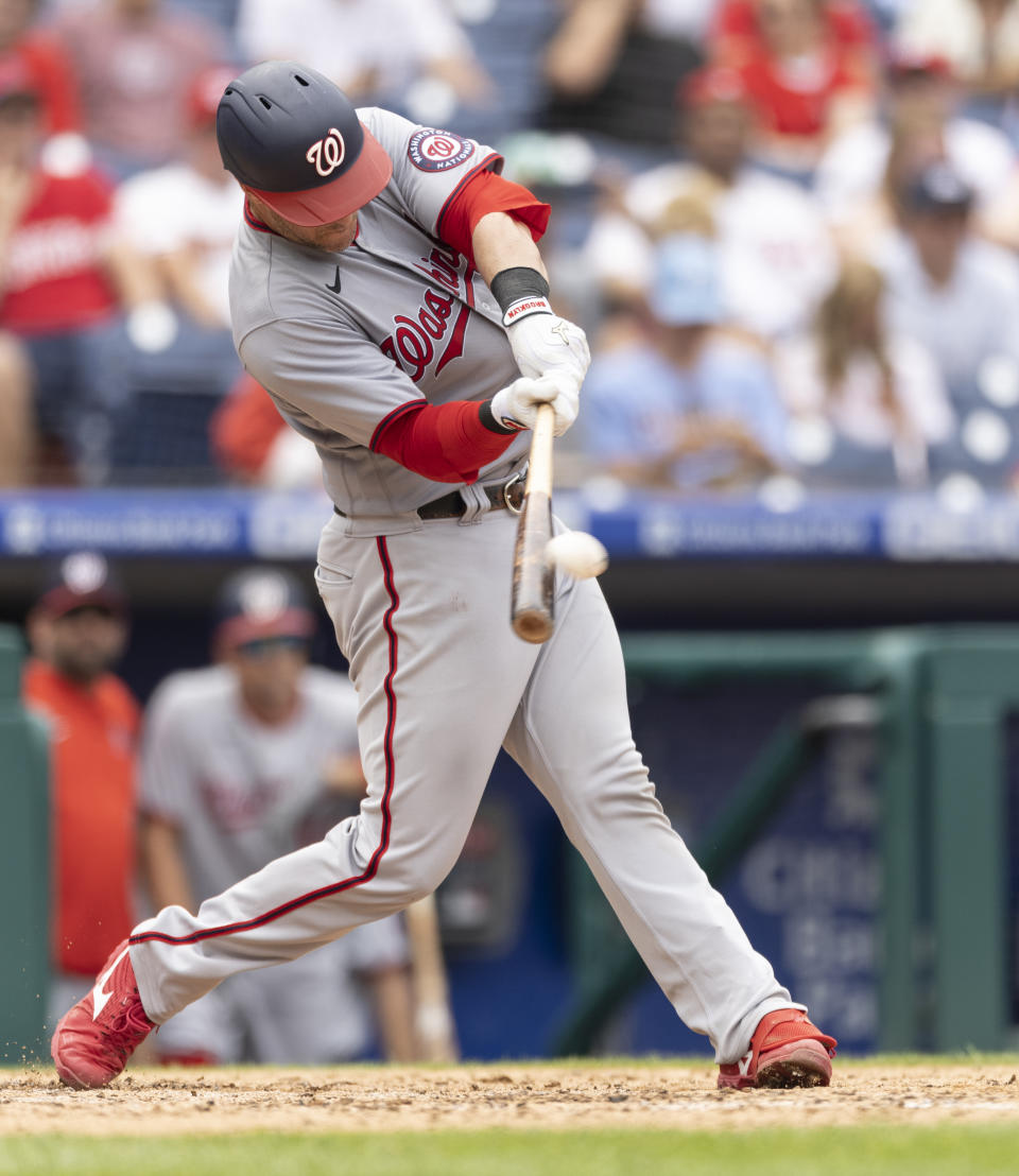 Washington Nationals' Yan Gomes hits a two-run home run during the seventh inning of a baseball game against the Philadelphia Phillies, Thursday, July 29, 2021, in Philadelphia in the first game of a double header. (AP Photo/Laurence Kesterson)