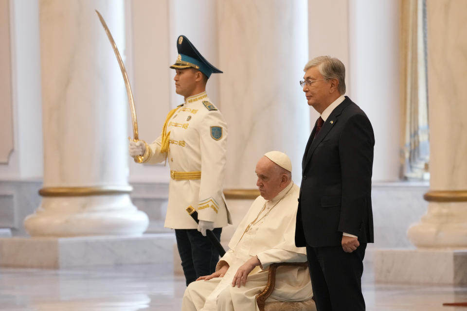 Pope Francis attends with Kazakhstan's President Kassym-Jomart Tokayev the welcome ceremony at the Presidential Palace Ak Orda, in Nur-Sultan, Kazakhstan, Tuesday, Sept. 13, 2022. Pope Francis begins a 3-days visit to the majority-Muslim former Soviet republic to minister to its tiny Catholic community and participate in a Kazakh-sponsored conference of world religious leaders. (AP Photo/Andrew Medichini)