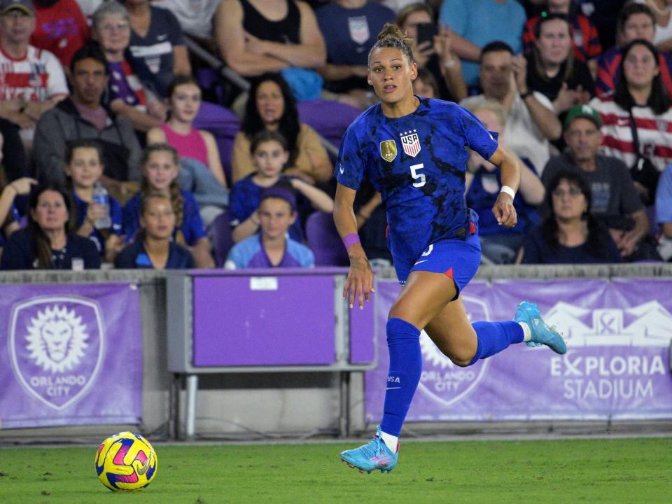 Trinity Rodman dribbles upfield for the USWNT.