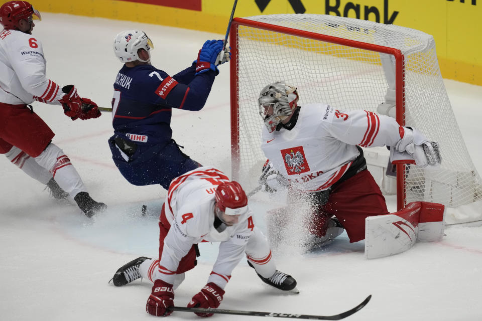 Unted States' Brady Tkachuk, second left, scores his side's second goal during the preliminary round match between Poland and United States at the Ice Hockey World Championships in Ostrava, Czech Republic, Friday, May 17, 2024. (AP Photo/Darko Vojinovic)