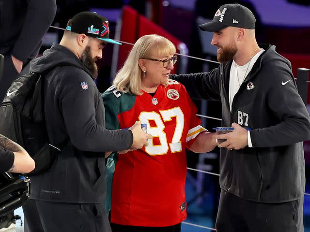 Christian Petersen/Getty Donna Kelce with Travis and Jason during Super Bowl LVII Opening Night in February 2023.