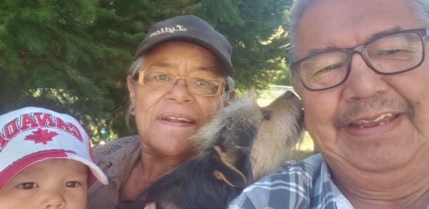 Byron Spinks, an elder from Lytton First Nation whose home was destroyed last month in a wildfire, was recently reunited with his dog Baby. (Byron Spinks/Submitted - image credit)