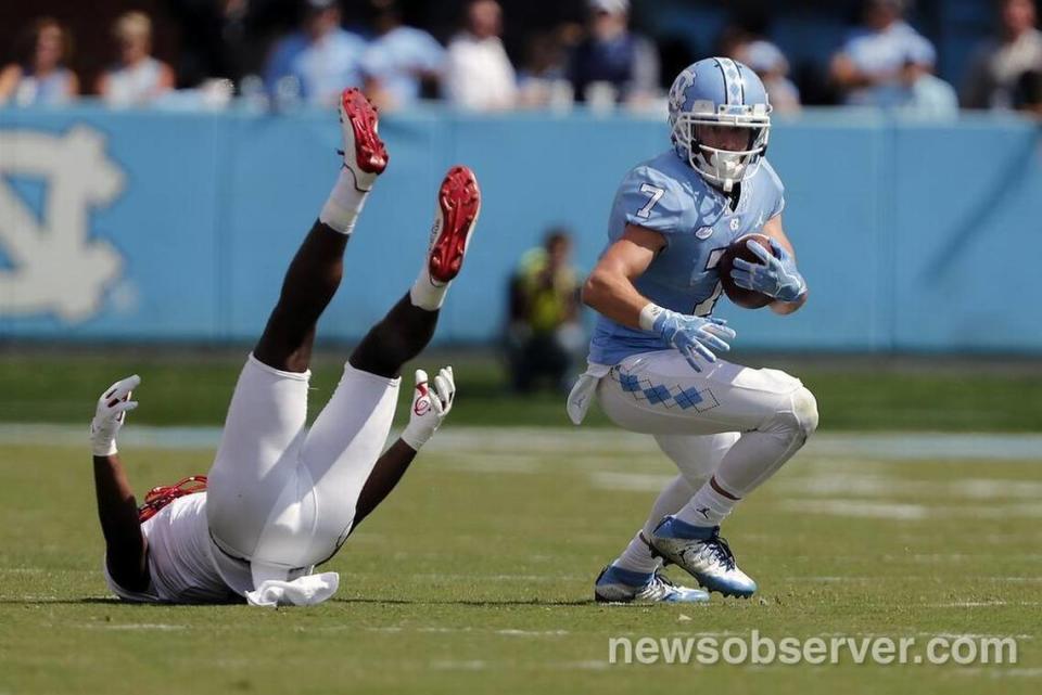 UNC’s Austin Proehl (7) gets away from Louisville’s Cornelius Sturghill (3) during the fourth quarter.